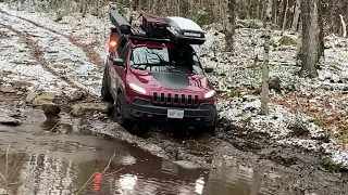 Cherokee (KL) running a muddy trail