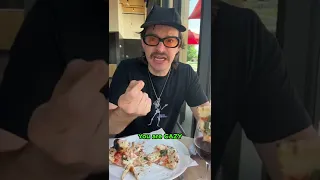 Italian husband reacts to pineapple on pizza in the wine.