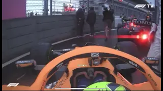 George Russell comforting Lando Norris after a devastating end to his race