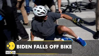 US President Joe Biden falls off bike during the beach ride, says 'I'm good' | English News | WION