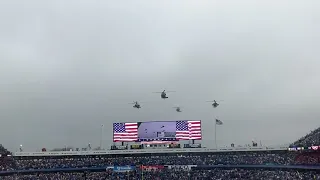 Helicopters go over the bills stadium