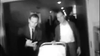 November 24, 1963 - Lee Harvey Oswald is rushed to Parkland Memorial Hospital in Dallas, Texas