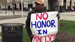 Native Americans protest the Chief Wahoo logo at the Cleveland Indians home opener