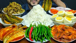 EATING SPICY PRAWN MASALA, PABDA FISH CURRY, BOILED EGGS, BRINJAL FRY, BHINDI FRY, SALAD & RICE