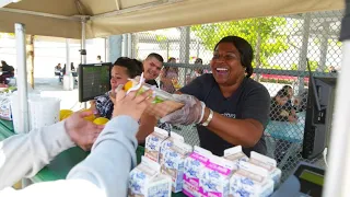 School cafeteria worker feeds the hungry well after lunch hour ends