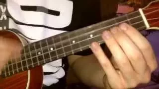 Radom guy playing raining blood by Slayer on the ukulele