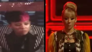 GD watching 2NE1 "I Love You" performance at SBS Gayo Daejun 2012