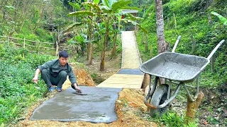 Construction progress of a solid bridge before the rainy season - Concrete paving and road upgrading