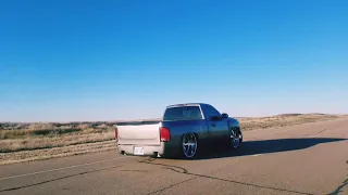 Chevy Silverado on 26x12 intro billet wheels slammed and cruisin