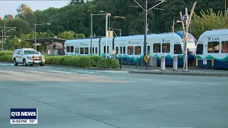 2 killed while crossing train tracks in Seattle