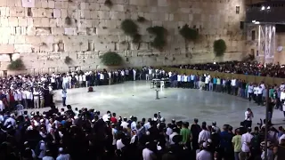 Massive group sings Ani Maamin (I believe) at the Kotel in Jerusalem