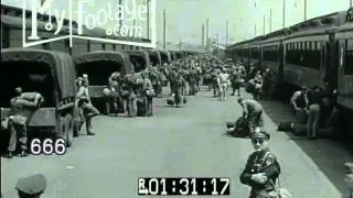 1940s Troops Disembark Train, March onto Base