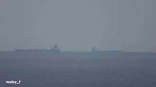 Zooming in on... 2 ships showing earth curve with Nikon P1000