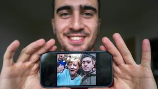 Der Mann vom Flüchtlings-Selfie mit Merkel: So geht es ihm heute | AFP