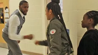 Charlotte teacher connects to students with handshakes