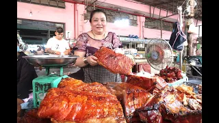 Chị Kim Mai chặt miếng heo quay da giòn rụm, văng lên văng xuống nhìn rất đả