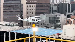 AW169 helicopter landing on a rooftop helipad