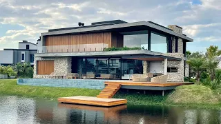 MANSÃO BEIRA LAGO A VENDA, NO CONDOMÍNIO FECHADO SENSE, EM XANGRI-LÁ/RS!!