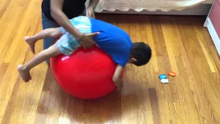 Pediatric Physical Therapy - Lying on tummy to sitting up over therapy ball