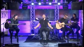 EXCLUSIVE: Disturbed Give Powerful Performance of "Hold On To Memories"