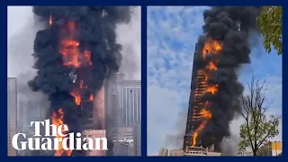 Huge fire engulfs skyscraper in China