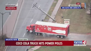 Coca Cola truck hits power poles