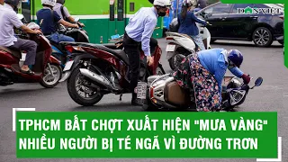 TPHCM bất chợt xuất hiện "mưa vàng", nhiều người bị té ngã vì đường trơn | Báo Dân Việt