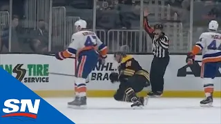 Leo Komarov Drops David Pastrnak With The Butt End Of His Stick