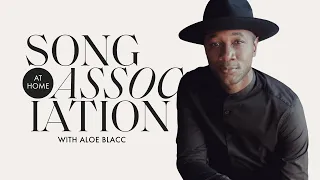 Aloe Blacc Sings Jay-Z, Whitney Houston, & "I Need a Dollar" in a Game of Song Association | ELLE