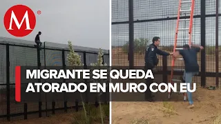 En Cd. Juárez, rescatan a migrante en la cima del muro fronterizo