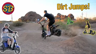 Electric Scooter Launches Off Of Dirt Jumps!