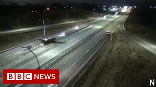 Plane makes emergency landing on US highway - BBC News