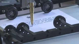 Phoenix company keeping the art of cursive alive with robots