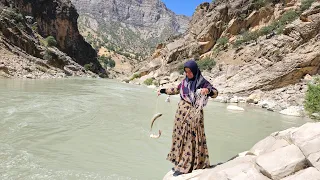 Nomad Life: Nomad Woman Fishing by the River | Embracing Nature's Bounty