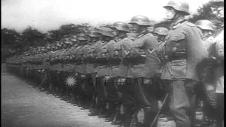 The Commander of the Berlin Guard reviews German soldiers as they march in German...HD Stock Footage