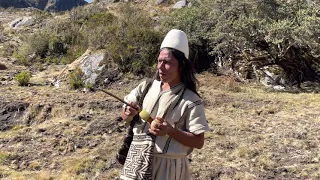 Arhuaco mamo prepares his poporo - Colombia
