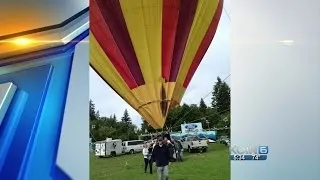 Hot air balloon catches on fire at festival