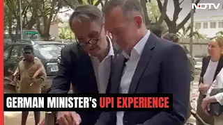 German Minister Buys Veggies From Roadside With UPI. Priceless Reaction