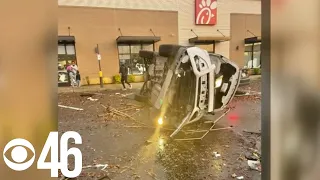 Woman describes moment tornado tossed her car in Covington