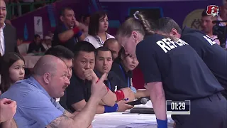 Olga Koroleva (RU) 50kg Gulzhohon Normatova (UZ)