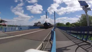 Steam train crossing Preston Dock bridge