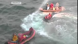 Freed Greenpeace activists arrive home