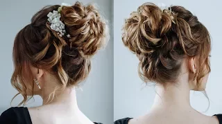 High curly messy bun the topknot updo