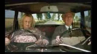 old couple driving