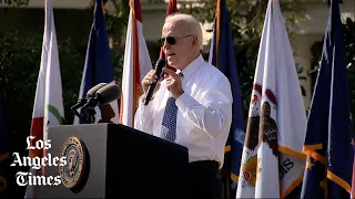 Biden touts inflation reduction law despite report