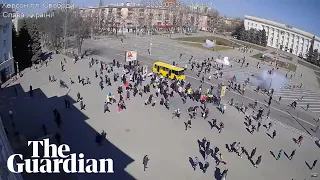 Russian troops use stun grenades and gunfire to clear Ukrainian protest in Kherson