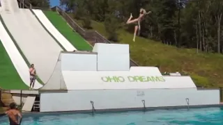 Girl Does A Slide Belly Flop Into Water