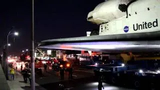 Space Shuttle Endeavour moving through Los Angeles