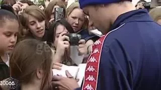 Damon signing autographs at charity football match, 1996