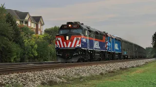 METX 101 (new paint) and 109 take Metra 2135 into Deerfield